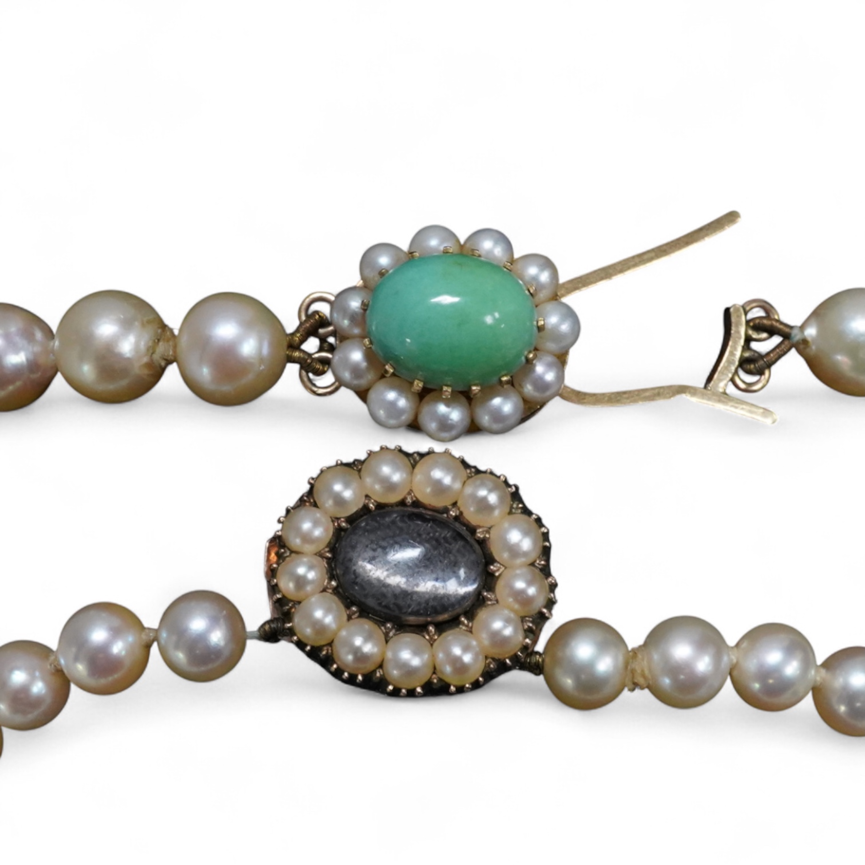 Two cultured pearl necklaces, comprising: one long strand of cultured pearls measuring approximately 7mm diameter, to a turquoise and cultured pearl clasp, length 86cm, clasp stamped 9ct; and a graduated cultured pearl n